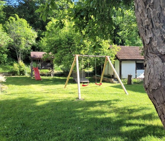 Garten und Kinderspielplatz der Irreler Mühle, © Irreler Mühle Ferienwohnungen & -häuser Garten und Kinderspielplatz der Irreler Mühle, © Irreler Mühle Ferienwohnungen & -häuser