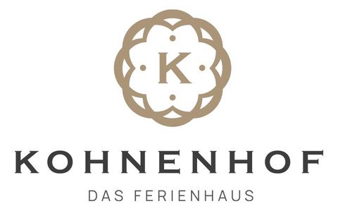 Ein elegantes Logo für das Ferienhaus Kohnenhof. Es zeigt den Schriftzug "Kohnenhof" in stilvollem Design.