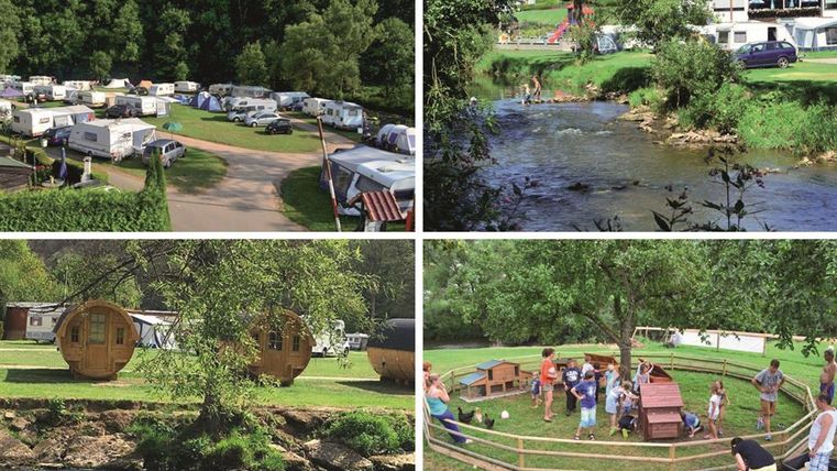 Ein schöner Campingplatz mit Wohnwagen und grünen Wiesen. Ein Fluss fließt in der Nähe, während Familien und Freunde im Freien Zeit verbringen.